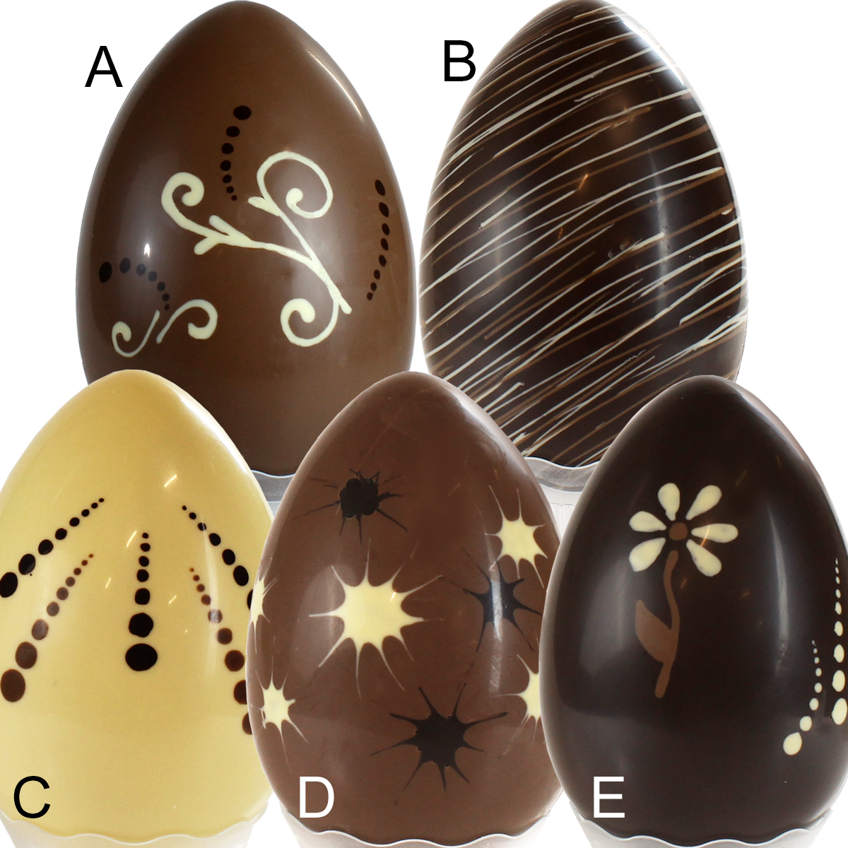 Uova di Pasqua di cioccolato con decorazioni fantasia al latte, bianco o  fondente