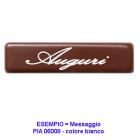 A message of good wishes on fondant chocolate in the form of a little name plate