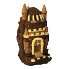 A spectacular castle with high towers all in milk chocolate and dark fondant chocolate, decorated by hand