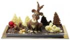 decorazione in cioccolato con renna e paesaggio invernale in vassoio 