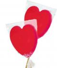 A red heart-shaped lollipop to celebrate love and Saint Valentine's Day