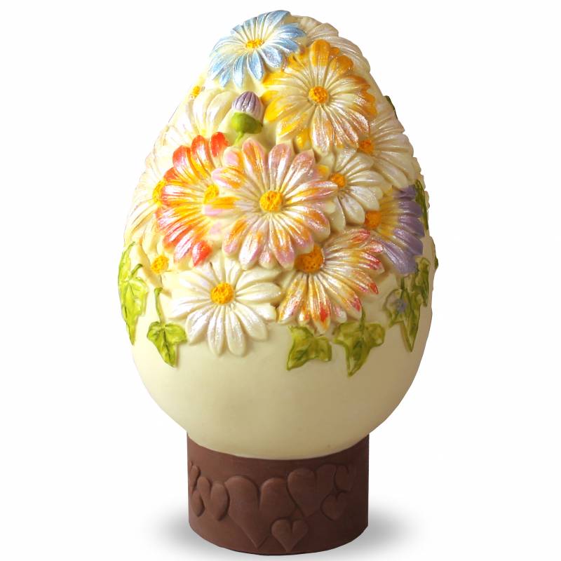 Uovo di Pasqua formato da margherite e auguri in italiano e inglese